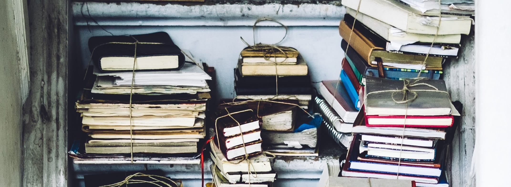 notebooks on a shelf